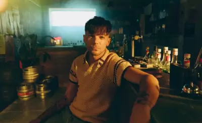 LOUIS TOMLINSON